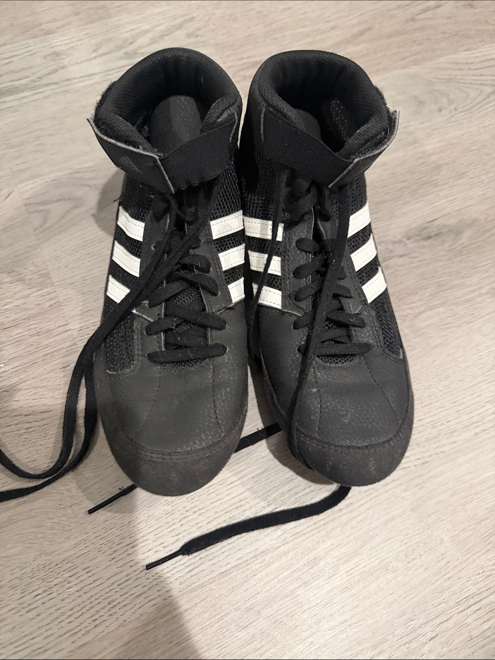 adidas Black High-Top wrestling shoes with White Stripes